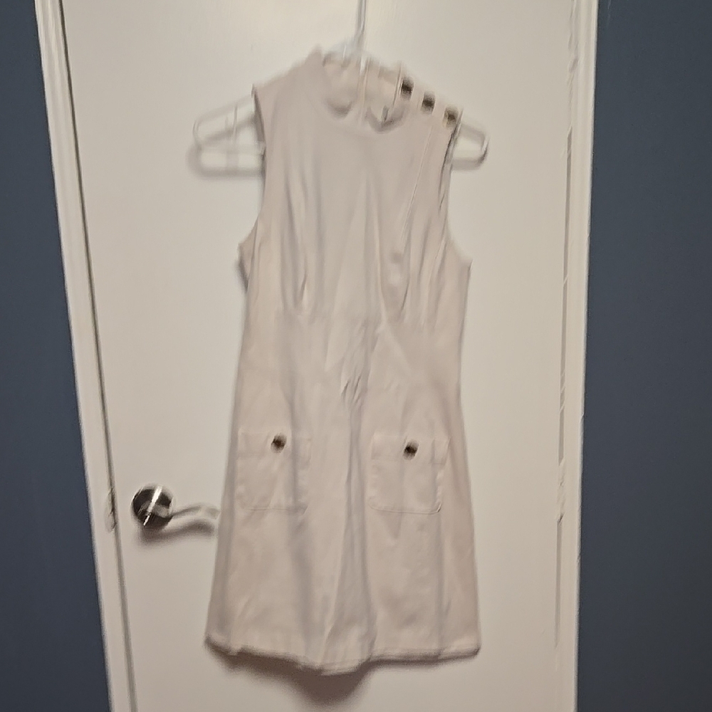 Sleeveless White Dress with Pockets
